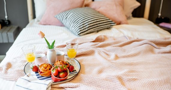 Tasty breakfast on the bed